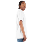Person wearing a plain white t-shirt on a white background