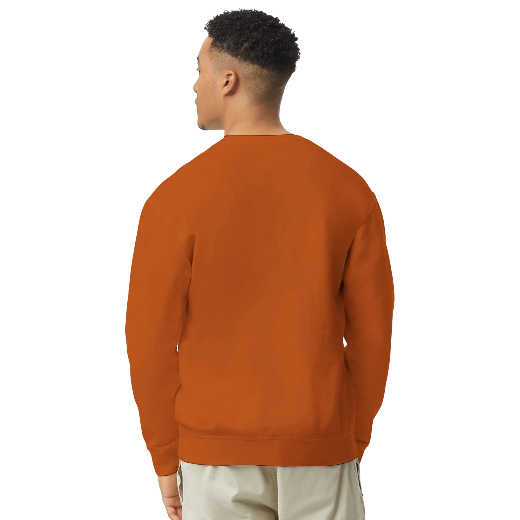 Person wearing an orange sweatshirt on a white background