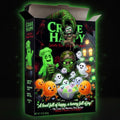 Box of Crave Happy toy mummies with Halloween-themed graphics on a dark background